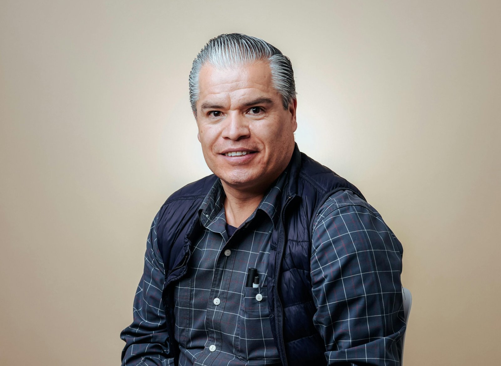 Smiling Man in a Shirt and a Vest